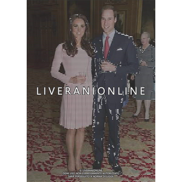 Her Majesty The Queen, accompanied by His Royal Highness The Duke of Edinburgh, gave a lunch at Windsor Castle for Sovereign Monarchs to commemorate her Diamond Jubilee. The Queen and The Duke of Edinburgh greeted their guests inside the Grand Vestibule, before joining them at a pre-lunch reception.THE DUKE AND DUCHESS OF CAMBRIDGE .. ©photoshot/Agenzia Aldo Liverani Sas - ITALY ONLY - REALI INGLESI: La regina d\'inghilterra incontra Re e regine, sovrani e capi di stato di 26 paesi stranieri al Castello di Windsor per un pranzo di celebrazione del Giubileo di diamante a Londra