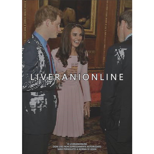The Duke and Duchess of Cambridge talks to Prince Harry before a reception in the Waterloo Chamber, before her Sovereign Monarchs Jubilee lunch at Windsor Castle. ©photoshot/Agenzia Aldo Liverani Sas - ITALY ONLY - REALI INGLESI: La regina d\'inghilterra incontra Re e regine, sovrani e capi di stato di 26 paesi stranieri al Castello di Windsor per un pranzo di celebrazione del Giubileo di diamante a Londra