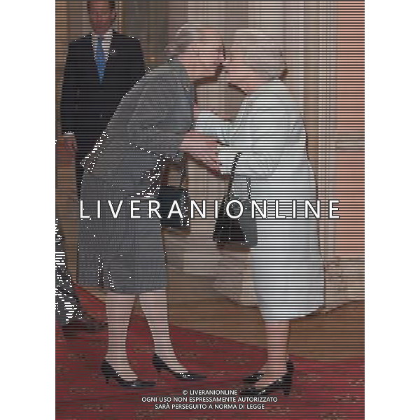 Queen Margarethe II of Denmark (left) is greeted by Queen Elizabeth II at a lunch for Sovereign Monarchs held in honour of Queen Elizabeth II\'s Diamond Jubilee, at Windsor Castle, in Windsor, Berkshire. ©photoshot/Agenzia Aldo Liverani Sas - ITALY ONLY - REALI INGLESI: La regina d\'inghilterra incontra Re e regine, sovrani e capi di stato di 26 paesi stranieri al Castello di Windsor per un pranzo di celebrazione del Giubileo di diamante a Londra
