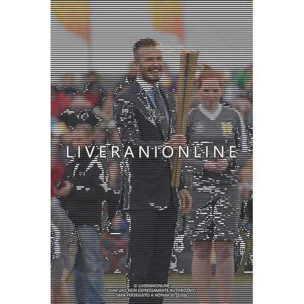 David Beckham during the ceremony to mark the arrival of the Olympic flame, at RNAS Culdrose, Cornwall. ©photoshot/Agenzia Aldo Liverani Sas - ITALY ONLY - Arrivo dell\'aereo che ha trasportato la fiamma olimpica delle Olimpiadi di londra 2012, fino alla base aerea RNAS Culdrose in Cornovaglia, Gran Bretagna, 18 maggio 2012 