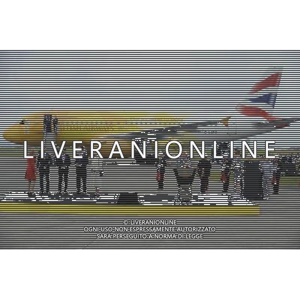 The ceremony to mark the arrival of the Olympic flame, at RNAS Culdrose, Cornwall. ©photoshot/Agenzia Aldo Liverani Sas - ITALY ONLY - Arrivo dell\'aereo che ha trasportato la fiamma olimpica delle Olimpiadi di londra 2012, fino alla base aerea RNAS Culdrose in Cornovaglia, Gran Bretagna, 18 maggio 2012 