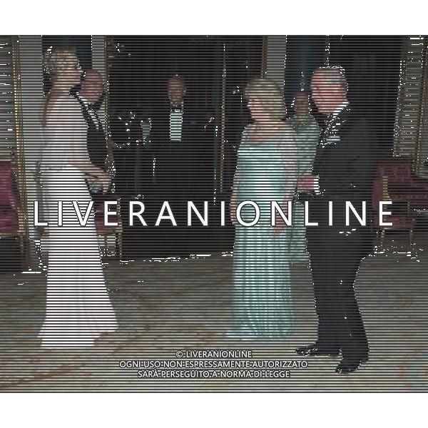 The Prince of Wales and the Duchess of Cornwall greet Prince Albert II and Princess Charlene of Monaco as they arrive for a dinner at Buckingham Palace, London, for foreign sovereigns to commemorate the Diamond Jubilee. ©photoshot/Agenzia Aldo Liverani Sas - ITALY ONLY - REALI INGLESI: Carlo Principe di Galles e la Duchessa di Cornovaglia ospite una cena per i sovrani stranieri per commemorare il giubileo di diamante a Buckingham Palace, a Londra. 
