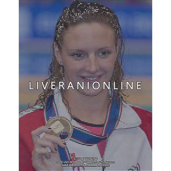 (120522) -- DEBRECEN, May 22, 2012 () -- Katinka Hosszu of Hungary celebrates her victory during the awarding ceremony after winning the women\'s 400m Individual Medley final at the 2012 European Swimming Championships in Debrecen, Hungary on May 21, 2012. Katinka Hosszu won the gold medal with 4 minutes and 33.76 seconds. (/Attila Volgyi) ©photoshot/AGENZIA ALDO LIVERANI SAS - ITALY ONLY - CAMPIONATI EUROPEI NUOTO a Debrecen, in Ungheria 21 maggio 2012.