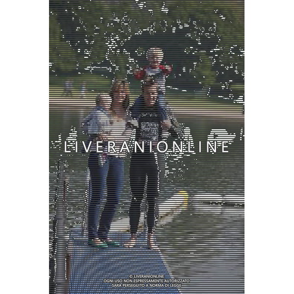 Adventurer Ben Fogle poses for photographs with his wife Marina and children Ludo (R), 2, and Iona, 1, by the Serpentine lake in Hyde Park to announce his latest challenge to swin across the Atlantic Ocean on May 23, 2012 in London, England. Mr Fogle will undertake the 3000 mile swim next year in his bid to become the second person to achieve the feat. ©PHOTOSHOT/ALDO LIVERANI SAS ITALY ONLY