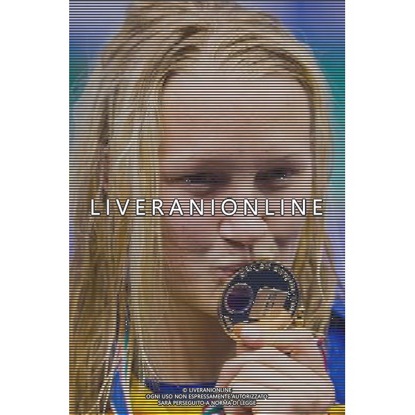 (120524) -- DEBRECEN, May 24, 2012 () -- Sarah Sjoestroem of Sweden celebrates her victory during the awarding ceremony for the Women\'s 100m Freestyle final at the 31th European Swimming Championships in Debrecen, Hungary on May 23, 2012. Sarah Sjoestroem won the gold with 53.61 seconds. (/Attila Volgyi) ©PHOTOSHOT/AGENZIA ALDO LIVERANI SAS - ITALY ONLY - Ungheria: CAMPIONATI EUROPEI DI NUOTO a Debrecen