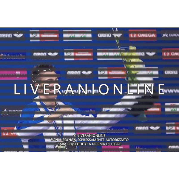 (120524) -- DEBRECEN, May 24, 2012 () -- Gregorio Paltrinieri of Italy reacts during the awarding cermony of the Men\'s 1500m Freestyle final at the 31th European Swimming Championships in Debrecen, Hungary on May 23, 2012. Gregorio Paltrinieri won the gold medal with 14 minutes and 48.92 seconds. (/Attila Volgyi) ©PHOTOSHOT/AGENZIA ALDO LIVERANI SAS - ITALY ONLY - Ungheria: CAMPIONATI EUROPEI DI NUOTO a Debrecen