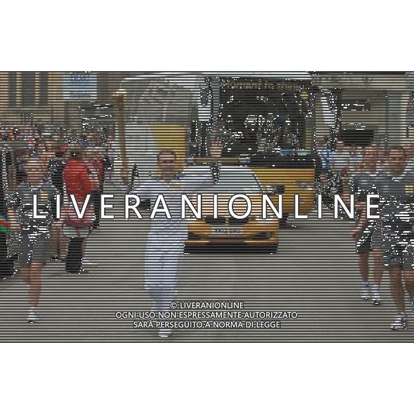 The Olympic torch is carried around Gloucester City Center by various runners on 24th May 2012. ©PHOTOSHOT/AGENZIA ALDO LIVERANI SAS - ITALY ONLY - La torcia olimpica di Londra 2012, portata attraverso il centro della citta\' di Gloucester 24 maggio 2012