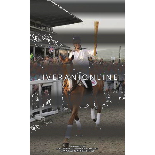  Zara Phillips on Toytown with the Olympic torch at Cheltenham Racecourse as part of the Olympic Torch Evening celebrations Date 23rd May 2012 AG ALDO LIVERANI S A S ONLY ITALY