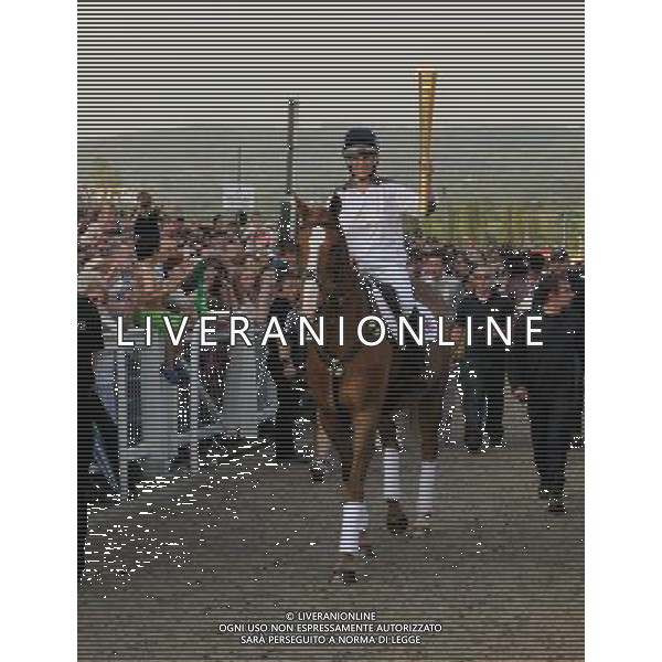  Zara Phillips on Toytown with the Olympic torch at Cheltenham Racecourse as part of the Olympic Torch Evening celebrations Date 23rd May 2012 AG ALDO LIVERANI S A S ONLY ITALY