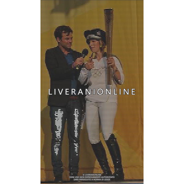  Zara Phillips on Toytown with the Olympic torch at Cheltenham Racecourse as part of the Olympic Torch Evening celebrations Date 23rd May 2012 AG ALDO LIVERANI S A S ONLY ITALY