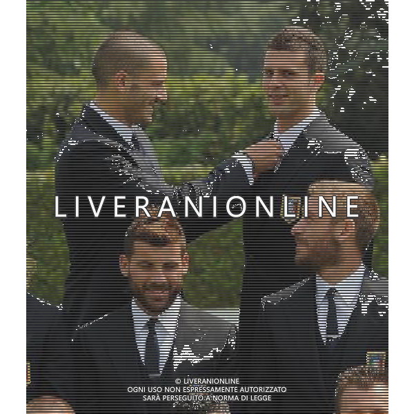 Raduno Nazionale Italiana Firenze - 21.05.2012 Foto Ufficiale della Nazionale Italiana in vista di EURO 2012 Nella Foto:bonucci aggiusta la cravatta a thiago motta /Ph.Vitez-Ag. Aldo Liverani