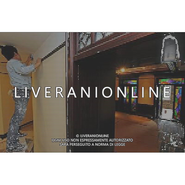 (120530) -- DEQING, May 30, 2012 () -- A worker repaints a wall in a villa on the Mogan Mountain in Deqing County, east China\'s Zhejiang Province. Foreigners began to build villas on the Mogan Mountain since 1896 because of its coolness and quietness. More than 250 villas, temples and chapels are preserved on the mountain. The buildings represent the architectural styles of China, Britain, Russia, the United States, France and Germany, winning the name of \'world modern architecture museum\'. The Mogan villas were listed in the six batch of national key cultural relics units of protection in May 2006. The Mogan Mountain was also selected by the New York Times as one of the 45 Places to Go in 2012. (/Tan Jin) (zkr) ©photoshot/AGENZIA ALDO LIVERANI SAS - ITALY ONLY - Piu\' di 250 ville, templi e cappelle sono conservate sulla montagna nel Monte Mogan in Deqing County, a est della Cina provincia di Zhejian 30 maggio 2012