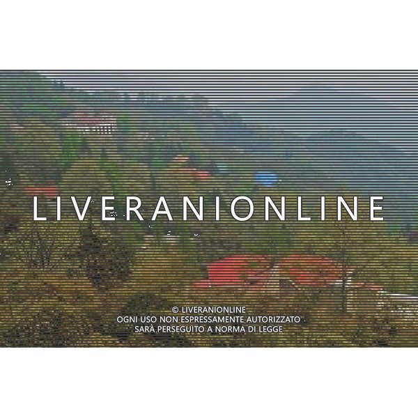 (120530) -- DEQING, May 30, 2012 () -- Photo taken on April 19, 2012 shows villas on the Mogan Mountain in Deqing County, east China\'s Zhejiang Province. Foreigners began to build villas on the Mogan Mountain since 1896 because of its coolness and quietness. More than 250 villas, temples and chapels are preserved on the mountain. The buildings represent the architectural styles of China, Britain, Russia, the United States, France and Germany, winning the name of \'world modern architecture museum\'. The Mogan villas were listed in the six batch of national key cultural relics units of protection in May 2006. The Mogan Mountain was also selected by the New York Times as one of the 45 Places to Go in 2012. (/Tan Jin) (zkr) ©photoshot/AGENZIA ALDO LIVERANI SAS - ITALY ONLY - Piu\' di 250 ville, templi e cappelle sono conservate sulla montagna nel Monte Mogan in Deqing County, a est della Cina provincia di Zhejian 30 maggio 2012