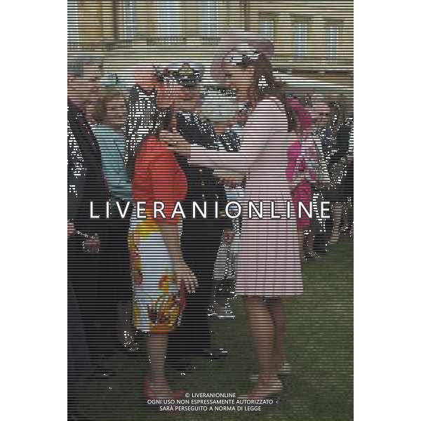 The Duchess of Cambridge laughs as she meets Bethan Haynes (3rd left) during a garden party at Buckingham Palace, London. ©photoshot/AGENZIA ALDO LIVERANI SAS - ITALY ONLY - La duchessa di Cambridge Kate Middleton riceve gli ospiti a Buckingham Palace per il Garden Party in occasione delle celebrazioni del giubileo di diamante della Regina Elisabetta II d\'Inghilterra a Londra il 29 maggio 2012