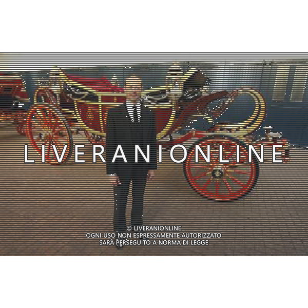 Embargoed to 0001 Tuesday May 29, 2012. Head coachman Jack Hargreaves poses with the 1902 State Landau carriage at the Royal Mews in Buckingham Palace, as the horses and carriages are prepared for Queen Elizabeth II\'s Diamond Jubilee. ©photoshot/AGENZIA ALDO LIVERANI SAS - ITALY ONLY - REALI INGLESI: Preparativi delle carrozze e cavalli per le celebrazioni del giubileo di diamante della regina Elisabetta II a Buckingham Palace, Londra