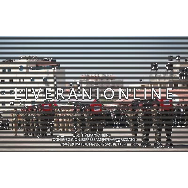 (120531)-- RAMALLAH, May 31, 2012 () -- Palestinian security members carry coffins during the funeral ceremony of 79 Palestinians after Israel handed over their remains, in the West Bank city of Ramallah, on May 31, 2012. Israel returned the remains of 91 Palestinian militants Thursday morning, and the bodies are on their way to the West Bank and Gaza, a Palestinian official said. (/Fadi Arouri) /PHOTOSHOT/AG ALDO LIVERANI SAS -ITALY ONLY - /PHOTOSHOT/AG ALDO LIVERANI SAS -ITALY ONLY -
