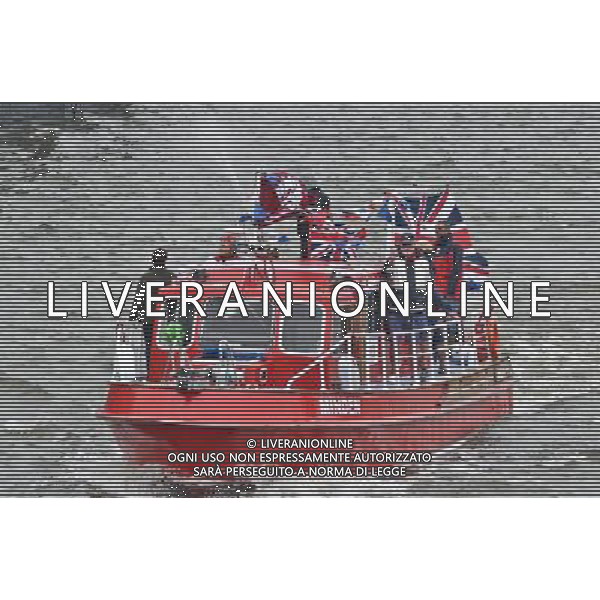  Picture Shows:Various boats take part at the Thames Diamond Jubilee Pageant to celebrate Her Majesty The Queen Elizabeth 2nd\'s 60 years as monarch of the United Kingdom. It is one of the largest flotillas ever assembled on the river. Rowed boats and working boats and pleasure vessels of all shapes and sizes will be beautifully dressed with streamers and Union Flags, their crews and passengers turned out in their finest rigs. The armed forces, fire, police, rescue and other services will be afloat and there will be an exuberance of historic boats, wooden launches, steam vessels and other boats of note. Date 03rd June 2012 *World Rights Only* *Unbylined uses will incur an additional discretionary fee!* /PHOTOSHOT/AG ALDO LIVERANI SAS - ITALY ONLY -