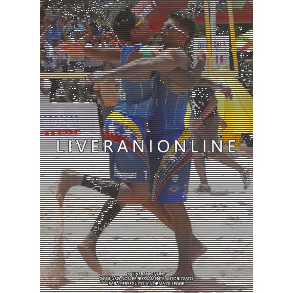(120603) -- NAGUANAGUA, June 3, 2012 () -- Jackson Rodriguez (L) and Farid Mussa of Venezuela celebrate their victory after the match \'B\' against Chile during the Intercontinental Cup pre-Olympic beach Voleyball, in Naguanagua, Venezuela, on June 2, 2012. Venezuela won 2-0. (/Juan Carlos Hernandez) (jh) (jp) (py) AG ALDO LIVERANI S A S ONLY ITALY