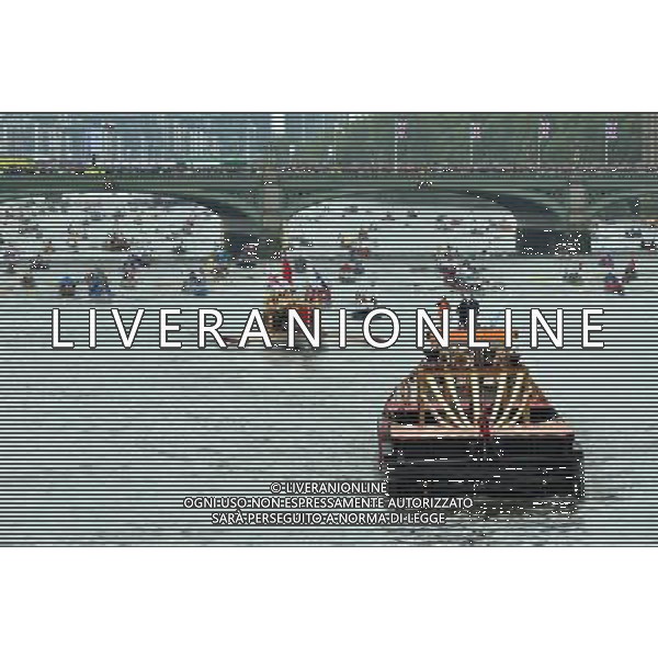 Various boats at the Thames Diamond Jubilee Pageant to celebrate Her Majesty The Queen Elizabeth 2nd\'s 60 years as monarch of the United Kingdom. It is one of the largest flotillas ever assembled on the river. Rowed boats and working boats and pleasure vessels of all shapes and sizes will be beautifully dressed with streamers and Union Flags, their crews and passengers turned out in their finest rigs. The armed forces, fire, police, rescue and other services will be afloat and there will be an exuberance of historic boats, wooden launches, steam vessels and other boats of note. Date 03rd June 2012 PHOTOSHOT/AG ALDO LIVERANI SAS ITALY ONLY -