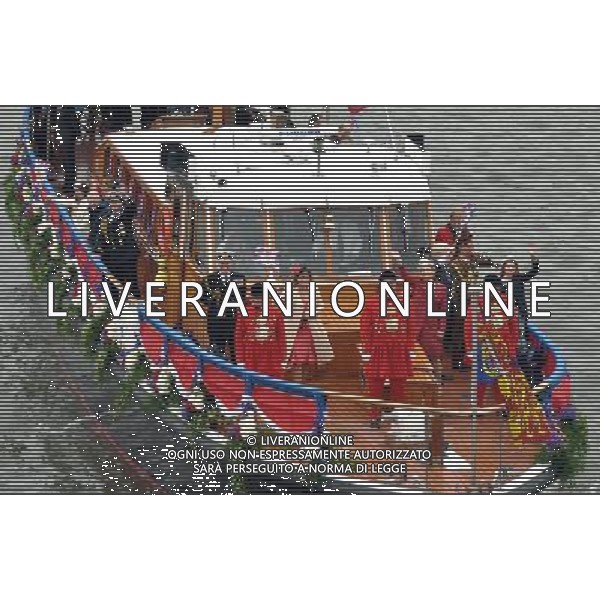 Various boats at the Thames Diamond Jubilee Pageant to celebrate Her Majesty The Queen Elizabeth 2nd\'s 60 years as monarch of the United Kingdom. It is one of the largest flotillas ever assembled on the river. Rowed boats and working boats and pleasure vessels of all shapes and sizes will be beautifully dressed with streamers and Union Flags, their crews and passengers turned out in their finest rigs. The armed forces, fire, police, rescue and other services will be afloat and there will be an exuberance of historic boats, wooden launches, steam vessels and other boats of note. Date 03rd June 2012 PHOTOSHOT/AG ALDO LIVERANI SAS ITALY ONLY -