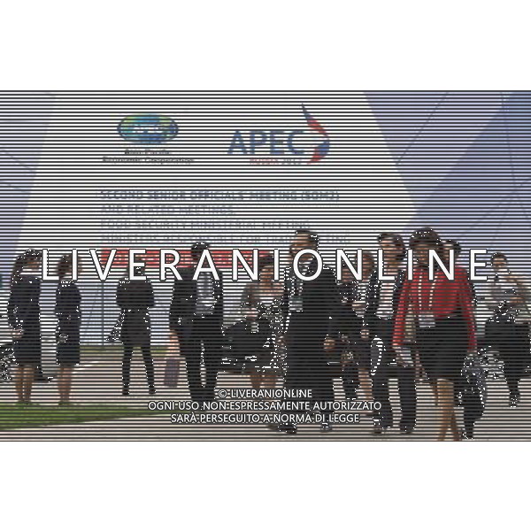 (120604) -- KAZAN, June 4, 2012 () -- Delegates arrive for the APEC meeting of trade ministers in Kazan, Russia, June 4, 2012. The two-day Asia-Pacific Economic Cooperation (APEC) Meeting of Ministers Responsible for Trade kicked off in Kazan on Monday, discussing trade and investment liberalization, regional economic integration, strengthening food security, establishing reliable supply chains, intensive cooperation to foster innovative growth and also the prospects of the Doha Development Agenda (DDA) negotiations in the World Trade Organization (WTO). (/Jiang Kehong) (zy) ©photoshot/Agenzia Aldo Liverani Sas - ITALY ONLY - Delegati partecipano alla riunione dei ministri del commercio dell\'Asia-Pacific Economic Cooperation (APEC) a Kazan, Russia, 4 giugno 2012.