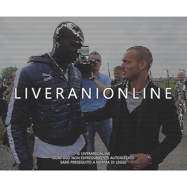 Campionati Europei UEFA 2012 Polonia/Ucraina Auschwitz (Polonia) - 06.06.2012 Visita della Nazionale a Auschwitz e Birkenau Nella Foto:balotelli saluta l\'ex compagno di squadra sneijder /Ph.Vitez-Ag. Aldo Liverani