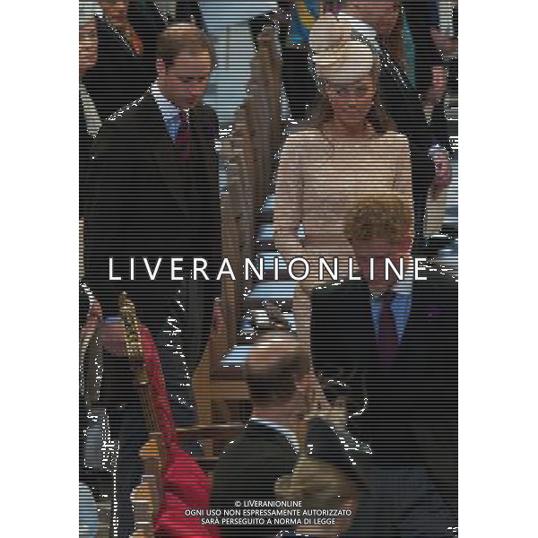 Britain\'s Prince William (L), Catherine, Duchess of Cambridge (R) and Prince Harry (C) attend a national service of thanksgiving to celebrate the QueenÕs Diamond Jubilee at St Paul\'s Cathedral in London on June 5, 2012. Britain\'s Queen Elizabeth II wraps up four days of diamond jubilee celebrations and festivities will conclude with a ceremonial carriage procession in London, a formal contrast to the spectacular pop tribute staged outside Buckingham Palace the day before. ©photoshot/AGENZIA ALDO LIVERANI SAS - ITALY ONLY - REALI INGLESI: La Regina Elisabetta II d\'inghilterra e la famiglia reale durante le celebrazioni del Giubileo di diamante