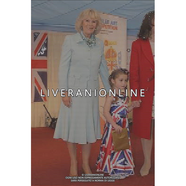 WADEBRIDGE, ENGLAND - JUNE 07: Camilla, Duchess of Cornwall presents an award to Winnie Clemo at the Royal Cornwall Show on June 7, 2012 in Wadebridge, England. The Duchess met members of the public and toured stands during her visit. /PHOTOSHOT/AG ALDO LIVERANI SAS - ITALY ONLY -