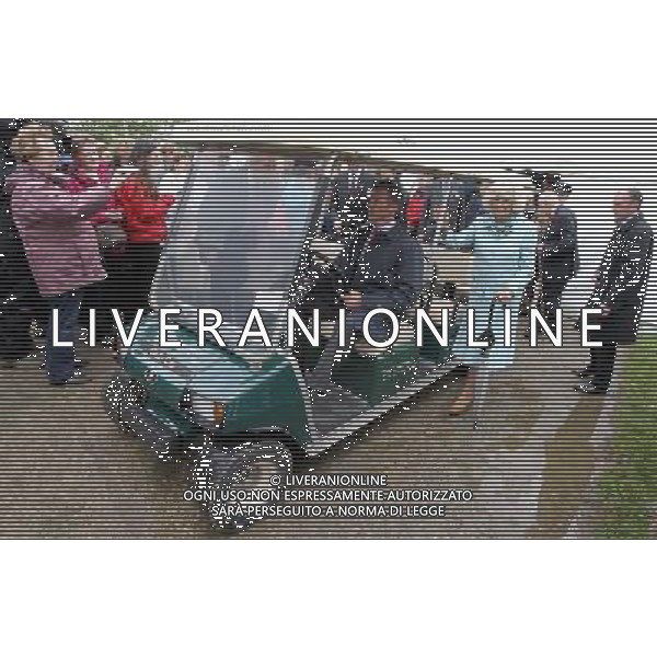 WADEBRIDGE, ENGLAND - JUNE 07: Camilla, Duchess of Cornwall travels by golfcart during a visit to the Royal Cornwall Show on June 7, 2012 in Wadebridge, England. The Duchess met members of the public and toured stands during her visit. /PHOTOSHOT/AG ALDO LIVERANI SAS - ITALY ONLY -