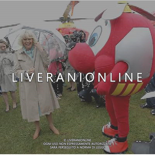 WADEBRIDGE, ENGLAND - JUNE 07: Camilla, Duchess of Cornwall meets the Cornwall Air Ambulance mascot during a visit to the Royal Cornwall Show on June 7, 2012 in Wadebridge, England. The Duchess met members of the public and toured stands during her visit. /PHOTOSHOT/AG ALDO LIVERANI SAS - ITALY ONLY -