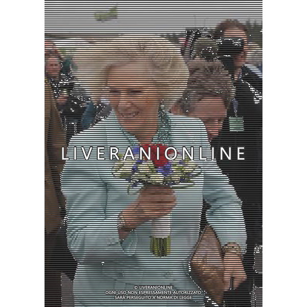 WADEBRIDGE, ENGLAND - JUNE 07: Camilla, Duchess of Cornwall arrives in windy conditions at the Royal Cornwall Show on June 7, 2012 in Wadebridge, England. The Duchess met members of the public and toured stands during her visit. /PHOTOSHOT/AG ALDO LIVERANI SAS - ITALY ONLY -