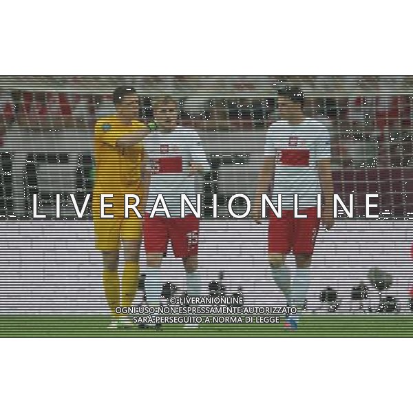 08.06.2012, WARSZAWA, PILKA NOZNA, FOOTBALL, MISTRZOSTWA EUROPY W PILCE NOZNEJ, EURO 2012, FOOTBALL EUROPEAN CHAMPIONSHIP, WOJCIECH SZCZESNY, DAMIEN PERQUIS, SEBASTIAN BOENISCH (POL) PO STRACIE GOLA, FOT. TOMASZ JASTRZEBOWSKI / FOTO OLIMPIK/NEWSPIX.PL --- Newspix.pl /AGENZIA ALDO LIVERANI SAS - ITALY ONLY - EDITORIAL USE ONLY Polonia - Grecia Campionati Europei UEFA 2012 Polonia/Ucraina Gruppo A Varsavia (Polonia) 08/06/2012 *** Local Caption *** www.newspix.pl mail us: info@newspix.pl call us: 0048 022 23 22 222 --- Polish Picture Agency by Ringier Axel Springer Poland