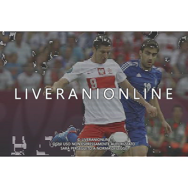 08.06.2012 WARSZAWA - STADION NARODOWY ( WARSAW POLAND NATIONAL STADIUM) PILKA NOZNA (FOOTBALL ) MISTRZOSTWA EUROPY W PILCE NOZNEJ UEFA EURO 2012 ( EUROPEAN CHAMPIONSHIPS UEFA EURO 2012 ) GRUPA A ( POOL A ) MECZ POLSKA - GRECJA ( GAME POLAND - GREECE ) NZ ROBERT LEWANDOWSKI ( L) SOKRATIS PAPASTATHOPOULOS ( P) FOTO KATARZYNA PLEWCZYNSKA/CYFRASPORT/NEWSPIX.PL --- Newspix.pl /AGENZIA ALDO LIVERANI SAS - ITALY ONLY - EDITORIAL USE ONLY Polonia - Grecia Campionati Europei UEFA 2012 Polonia/Ucraina Gruppo A Varsavia (Polonia) 08/06/2012 *** Local Caption *** www.newspix.pl mail us: info@newspix.pl call us: 0048 022 23 22 222 --- Polish Picture Agency by Ringier Axel Springer Poland