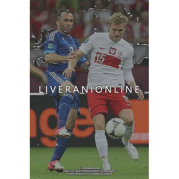 08.06.2012 WARSZAWA - STADION NARODOWY ( WARSAW POLAND NATIONAL STADIUM) PILKA NOZNA (FOOTBALL ) MISTRZOSTWA EUROPY W PILCE NOZNEJ UEFA EURO 2012 ( EUROPEAN CHAMPIONSHIPS UEFA EURO 2012 ) GRUPA A ( POOL A ) MECZ POLSKA - GRECJA ( GAME POLAND - GREECE ) NZ AVRAAM PAPADOPOULOS (L) DAMIEN PERQUIS (P) FOTO MATEUSZ TRZUSKOWSKI/CYFRASPORT/NEWSPIX.PL --- Newspix.pl /AGENZIA ALDO LIVERANI SAS - ITALY ONLY - EDITORIAL USE ONLY Polonia - Grecia Campionati Europei UEFA 2012 Polonia/Ucraina Gruppo A Varsavia (Polonia) 08/06/2012 *** Local Caption *** www.newspix.pl mail us: info@newspix.pl call us: 0048 022 23 22 222 --- Polish Picture Agency by Ringier Axel Springer Poland