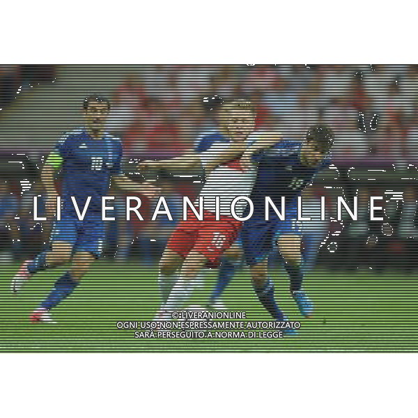 08.06.2012 WARSZAWA PILKA NOZNA KADRA REPREZENTACJA EURO2012 POLSKA I UKRAINA FOOTBALL UEFA EURO 2012 POLAND AND UKRAINE POLSKA - GRECJA POLAND VS. GREECE N/Z JAKUB BLASZCZYKOWSKI SOKRATIS PAPASTATHOPOULOS FOT LUKASZ LASKOWSKI / PRESSFOCUS NEWSPIXPL --- Newspix.pl /AGENZIA ALDO LIVERANI SAS - ITALY ONLY - EDITORIAL USE ONLY Polonia - Grecia Campionati Europei UEFA 2012 Polonia/Ucraina Gruppo A Varsavia (Polonia) 08/06/2012 *** Local Caption *** www.newspix.pl mail us: info@newspix.pl call us: 0048 022 23 22 222 --- Polish Picture Agency by Ringier Axel Springer Poland