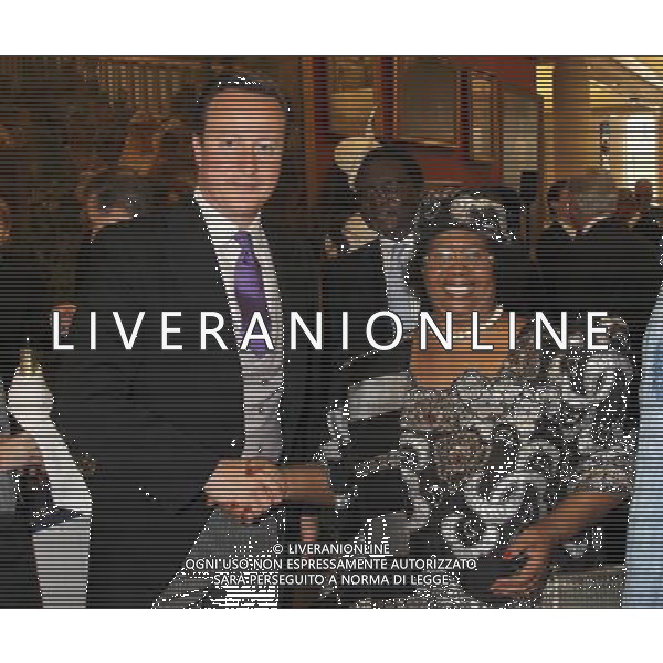 LONDON, ENGLAND - JUNE 05: British Prime Minister David Cameron greets a guest at the Diamond Jubilee Reception at Guildhall on June 5, 2012 in London, England. For only the second time in its history the UK celebrates the Diamond Jubilee of a monarch. Her Majesty Queen Elizabeth II celebrates the 60th anniversary of her ascension to the throne. Thousands of wellwishers from around the world have flocked to London to witness the spectacle of the weekend\'s celebrations. ©photoshot/Agenzia Aldo Liverani Sas - ITALY ONLY - REALI INGLESI: La famiglia reale con gli invitai al ricevimento per le celebrazioni del Giubileo diamante di Sua Maesta\' la Regina Elisabetta II a Londra 5 giugno 2012