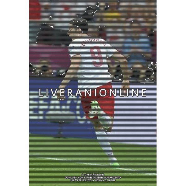 (120609) -- WARSAW, June 9, 2012 () -- Robert Lewandowski of Poland celebrates after scoring during the Group A match against Greece at the Euro 2012 football championship in Warsaw, Poland, June 8, 2012. (/Ma Ning) (jyc) ©photoshot/Agenzia Aldo Liverani Sas - ITALY ONLY: Polonia - Grecia Campionati Europei UEFA 2012 Polonia/Ucraina Gruppo A Varsavia (Polonia) 08/06/2012