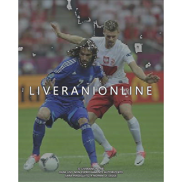 (120609) -- WARSAW, June 9, 2012 () -- Lukasz Piszczek (R) of Poland vies with Giorgos Samaras of Greece during their Group A match at the Euro 2012 football championship in Warsaw, Poland, June 8, 2012. (/Ma Ning) (jyc) ©photoshot/Agenzia Aldo Liverani Sas - ITALY ONLY: Polonia - Grecia Campionati Europei UEFA 2012 Polonia/Ucraina Gruppo A Varsavia (Polonia) 08/06/2012