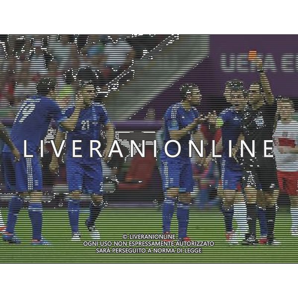 (120609) -- WARSAW, June 9, 2012 () -- Sokratis Papastathopoulos of Greece (1st L) receives a red card during the Group A match against Poland at the Euro 2012 football championship in Warsaw, Poland, June 8, 2012. (/Ma Ning) (jyc) ©photoshot/Agenzia Aldo Liverani Sas - ITALY ONLY: Polonia - Grecia Campionati Europei UEFA 2012 Polonia/Ucraina Gruppo A Varsavia (Polonia) 08/06/2012
