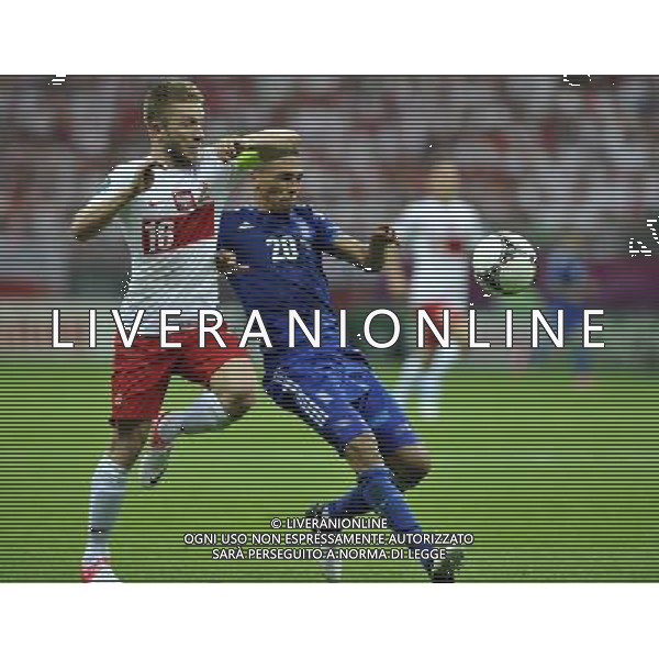 (120609) -- WARSAW, June 9, 2012 () -- Jakub Blaszczykowski (L) of Poland vies with Jose Holebas of Greece during their Group A match at the Euro 2012 football championship in Warsaw, Poland, June 8, 2012. (/Ma Ning) (jyc) ©photoshot/Agenzia Aldo Liverani Sas - ITALY ONLY: Polonia - Grecia Campionati Europei UEFA 2012 Polonia/Ucraina Gruppo A Varsavia (Polonia) 08/06/2012