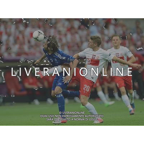 (120609) -- WARSAW, June 9, 2012 () -- Giorgos Samaras (L) of Greece vies with Lukasz Piszczek (C) of Poland during their Group A match at the Euro 2012 football championship in Warsaw, Poland, June 8, 2012. The match ended in a 1-1 draw. (/Liu Lihang) (jyc) ©photoshot/Agenzia Aldo Liverani Sas - ITALY ONLY: Polonia - Grecia Campionati Europei UEFA 2012 Polonia/Ucraina Gruppo A Varsavia (Polonia) 08/06/2012