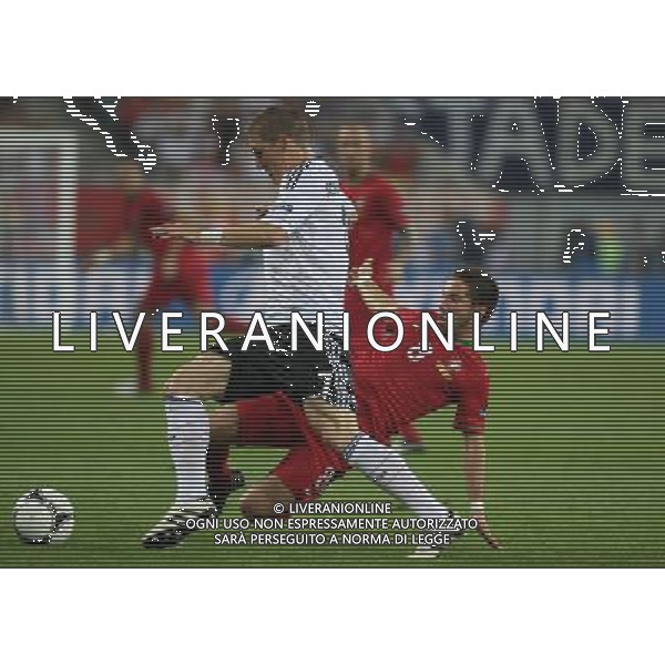 09.06.2012, LWOW, PILKA NOZNA, FOOTBALL, MISTRZOSTWA EUROPY W PILCE NOZNEJ, EURO 2012, FOOTBALL EUROPEAN CHAMPIONSHIP, NIEMCY - PORTUGALIA, GERMANY - PORTUGAL, BASTIAN SCHWEINSTEIGER (GER), JOAO MOUTINHO (POR) , FOT. TOMASZ JASTRZEBOWSKI / FOTO OLIMPIK/NEWSPIX.PL --- Newspix.pl /Agenzia Aldo Liverani Sas - ITALY ONLY: Germania - Portogallo Campionati Europei UEFA 2012 Polonia/Ucraina Gruppo B Leopoli (Ucraina) 09/06/2012 *** Local Caption *** www.newspix.pl mail us: info@newspix.pl call us: 0048 022 23 22 222 --- Polish Picture Agency by Ringier Axel Springer Poland