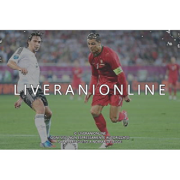 09.06.2012 LWOW - STADION ARENA LWOW ( LVIV UKRAINE STADIUM ARENA LVIV ) PILKA NOZNA ( FOOTBALL ) MISTRZOSTWA EUROPY W PILCE NOZNEJ UEFA EURO 2012 ( EUROPEAN CHAMPIONSHIPS UEFA EURO 2012 ) GRUPA B ( POOL B ) MECZ NIEMCY - PORTUGALIA ( GAME GERMANY - PORTUGAL ) NZ MATS HUMMELS (L), CRISTIANO RONALDO (P) FOTO MICHAL STANCZYK / CYFRASPORT/NEWSPIX.PL --- Newspix.pl /Agenzia Aldo Liverani Sas - ITALY ONLY: Germania - Portogallo Campionati Europei UEFA 2012 Polonia/Ucraina Gruppo B Leopoli (Ucraina) 09/06/2012 *** Local Caption *** www.newspix.pl mail us: info@newspix.pl call us: 0048 022 23 22 222 --- Polish Picture Agency by Ringier Axel Springer Poland