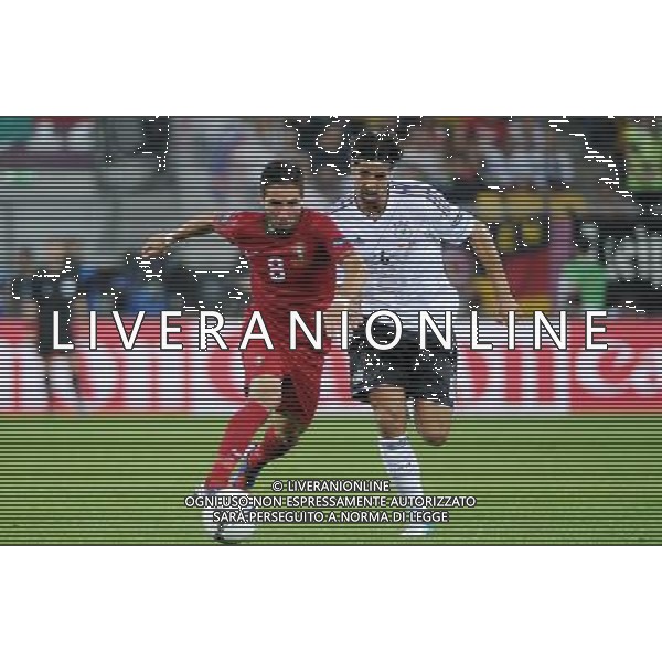 09.06.2012 LWOW UKRAINA (LVIV UKRAINE) ARENA LWOW (ARENA LVIV) PILKA NOZNA (FOOTBALL FUSSBALL) UEFA EURO 2012 POLAND UKRAINE MISTRZOSTWA EUROPY W PILCE NOZNEJ POLSKA UKRAINA MECZ NIEMCY - PORTUGALIA (GERMANY - PORTUGAL DEUTSCHLAND - PORTUGAL) N/Z JOAO MOUTINHO SAMI KHEDIRA FOTO NORBERT BARCZYK / PRESSFOCUS/NEWSPIX.PL --- Newspix.pl /Agenzia Aldo Liverani Sas - ITALY ONLY: Germania - Portogallo Campionati Europei UEFA 2012 Polonia/Ucraina Gruppo B Leopoli (Ucraina) 09/06/2012 *** Local Caption *** www.newspix.pl mail us: info@newspix.pl call us: 0048 022 23 22 222 --- Polish Picture Agency by Ringier Axel Springer Poland