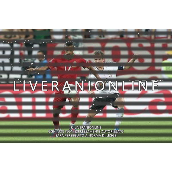 LWOW 09.06.2012 MECZ MISTRZOSTWA EUROPY 2012 GRUPA B: NIEMCY - PORTUGALIA --- UEFA EURO 2012 CHAMPIONSHIP GROUP B MATCH IN LVIV: GERMANY - PORTUGAL NANI PHILIPP LAHM FOT. PIOTR KUCZA/NEWSPIX.PL --- Newspix.pl /Agenzia Aldo Liverani Sas - ITALY ONLY: Germania - Portogallo Campionati Europei UEFA 2012 Polonia/Ucraina Gruppo B Leopoli (Ucraina) 09/06/2012 *** Local Caption *** www.newspix.pl mail us: info@newspix.pl call us: 0048 022 23 22 222 --- Polish Picture Agency by Ringier Axel Springer Poland