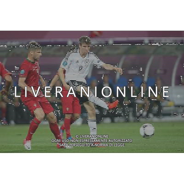 LWOW 09.06.2012 MECZ MISTRZOSTWA EUROPY 2012 GRUPA B: NIEMCY - PORTUGALIA --- UEFA EURO 2012 CHAMPIONSHIP GROUP B MATCH IN LVIV: GERMANY - PORTUGAL MIGUEL VELOSO THOMAS MULLER FOT. PIOTR KUCZA/NEWSPIX.PL --- Newspix.pl /Agenzia Aldo Liverani Sas - ITALY ONLY: Germania - Portogallo Campionati Europei UEFA 2012 Polonia/Ucraina Gruppo B Leopoli (Ucraina) 09/06/2012 *** Local Caption *** www.newspix.pl mail us: info@newspix.pl call us: 0048 022 23 22 222 --- Polish Picture Agency by Ringier Axel Springer Poland