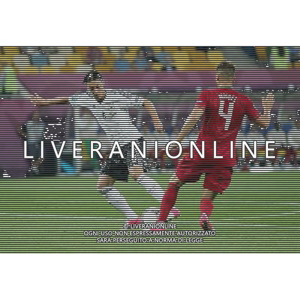 LWOW STADION OLIMPIJSKI 09.06.2012 EURO 2012 PILKA NOZNA GRUPA B NIEMCY - PORTUGALIA NZ MESUT OEZIL GER MIGUEL VELOSO POR FOT MICHAL NOWAK / NEWSPIX.PL LVIV OLYMPIC STADIUM 09.06.2012 EURO 2012 GROUP B GERMANY - PORTUGAL MESUT OEZIL GER MIGUEL VELOSO POR MICHAL NOWAK / NEWSPIX.PL --- Newspix.pl /Agenzia Aldo Liverani Sas - ITALY ONLY: Germania - Portogallo Campionati Europei UEFA 2012 Polonia/Ucraina Gruppo B Leopoli (Ucraina) 09/06/2012 *** Local Caption *** www.newspix.pl mail us: info@newspix.pl call us: 0048 022 23 22 222 --- Polish Picture Agency by Ringier Axel Springer Poland