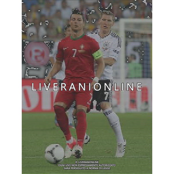 09.06.2012, LWOW, PILKA NOZNA, FOOTBALL, MISTRZOSTWA EUROPY W PILCE NOZNEJ, EURO 2012, FOOTBALL EUROPEAN CHAMPIONSHIP, NIEMCY - PORTUGALIA, GERMANY - PORTUGAL, CRISTIANO RONALDO (POR), BASTIAN SCHWEINSTEIGER (GER), FOT. TOMASZ JASTRZEBOWSKI / FOTO OLIMPIK/NEWSPIX.PL --- Newspix.pl *** Local Caption *** www.newspix.pl mail us: info@newspix.pl call us: 0048 022 23 22 222 --- Polish Picture Agency by Ringier Axel Springer Poland