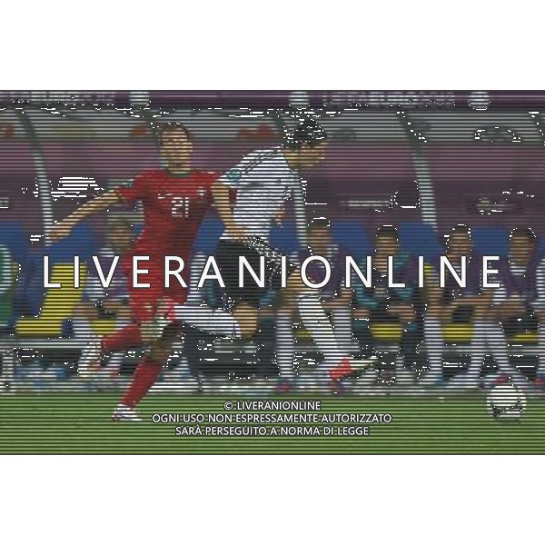 09.06.2012, LWOW, PILKA NOZNA, FOOTBALL, MISTRZOSTWA EUROPY W PILCE NOZNEJ, EURO 2012, FOOTBALL EUROPEAN CHAMPIONSHIP, NIEMCY - PORTUGALIA, GERMANY - PORTUGAL, JOAO PEREIRA (POR), MESUT OZIL (GER), FOT. TOMASZ JASTRZEBOWSKI / FOTO OLIMPIK/NEWSPIX.PL --- Newspix.pl *** Local Caption *** www.newspix.pl mail us: info@newspix.pl call us: 0048 022 23 22 222 --- Polish Picture Agency by Ringier Axel Springer Poland