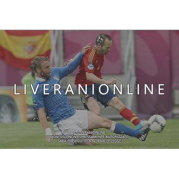 10.06.2012 GDANSK - ARENA GDANSK ( GDANSK POLAND ARENA GDANSK STADIUM STADIUM) PILKA NOZNA (FOOTBALL ) MISTRZOSTWA EUROPY W PILCE NOZNEJ UEFA EURO 2012 ( EUROPEAN CHAPIONSHIPS UEFA EURO 2012 ) GRUPA C ( POOL C) MECZ HISZPANIA - WLOCHY ( GAME SPAIN - ITALY ) NZ DANIELE DE ROSSI (L) ANDRÃ‰S INIESTA (P) FOTO MATEUSZ TRZUSKOWSKI/CYFRASPORT/NEWSPIX.PL --- Newspix.pl /Agenzia Aldo Liverani Sas - ITALY ONLY - Spagna-Italia Campionati Europei UEFA 2012 Polonia/Ucraina Gruppo C Danzica (Polonia) 10/06/2012 *** Local Caption *** www.newspix.pl mail us: info@newspix.pl call us: 0048 022 23 22 222 --- Polish Picture Agency by Ringier Axel Springer Poland